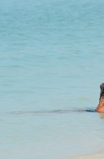 MEGAN MCKENNA in Bikini at a Beach in Dubai 12/13/2016