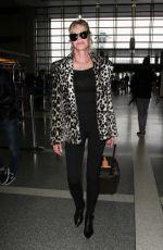 MELANIE GRIFFITH at LAX Airport in Los Angeles 12/09/2016