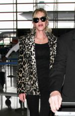 MELANIE GRIFFITH at LAX Airport in Los Angeles 12/09/2016