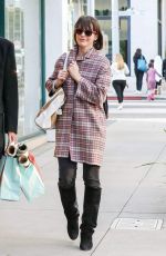MILLA JOVOVICH Out Shopping in Beverly Hills 12/22/2016