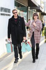 MILLA JOVOVICH Out Shopping in Beverly Hills 12/22/2016