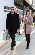 MILLA JOVOVICH Out Shopping in Beverly Hills 12/22/2016