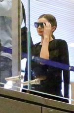 MIRANDA KERR at Los Angeles International Airport 12/27/2016