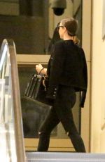 MIRANDA KERR at Los Angeles International Airport 12/27/2016