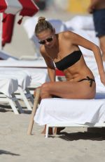 NATASHA POLY in Bikini at a Beach in Miami 11/29/2016