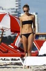NATASHA POLY in Bikini at a Beach in Miami 11/29/2016