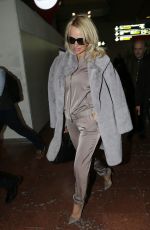 PAMELA ANDERSON at Charles De Gaulle Airport in Paris 12/17/2016