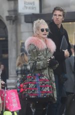 POPPY DELEVINGNE Out for Shopping on Bond Street in London 12/22/2016