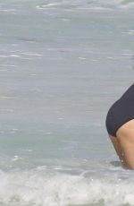 RICKI LAKE in Swimsuit with a Friend on the Beach in Cancun 12/27/2016