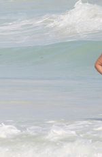 RICKI LAKE in Swimsuit with a Friend on the Beach in Cancun 12/27/2016