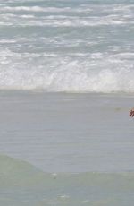 RICKI LAKE in Swimsuit with a Friend on the Beach in Cancun 12/27/2016