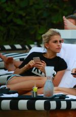 XENIA TCHOUMITCHEVA and CAROLINE DAUR at a Pool in Miami 12/07/2016