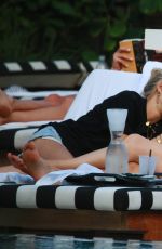 XENIA TCHOUMITCHEVA and CAROLINE DAUR at a Pool in Miami 12/07/2016