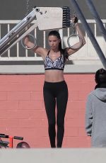 ADRIANA LIMA on the Set of Victoria