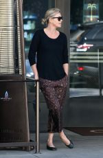 CHARLIZE THERON Out and About in Beverly Hills 01/17/2017