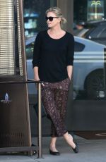 CHARLIZE THERON Out and About in Beverly Hills 01/17/2017