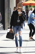 CHARLOTTE MCKINNEY in Ripped Jeans Out in Beverly Hills 01/30/2017