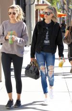 CHARLOTTE MCKINNEY in Ripped Jeans Out in Beverly Hills 01/30/2017