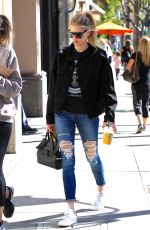 CHARLOTTE MCKINNEY in Ripped Jeans Out in Beverly Hills 01/30/2017