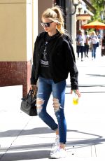 CHARLOTTE MCKINNEY in Ripped Jeans Out in Beverly Hills 01/30/2017