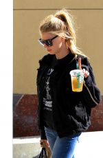 CHARLOTTE MCKINNEY in Ripped Jeans Out in Beverly Hills 01/30/2017