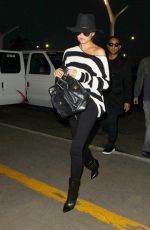 CHRISSY TEIGEN and John Legend at LAX Airport in Los Angeles 01/06/2017
