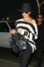 CHRISSY TEIGEN and John Legend at LAX Airport in Los Angeles 01/06/2017