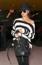 CHRISSY TEIGEN and John Legend at LAX Airport in Los Angeles 01/06/2017