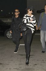 CHRISSY TEIGEN and John Legend at LAX Airport in Los Angeles 01/06/2017