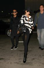 CHRISSY TEIGEN and John Legend at LAX Airport in Los Angeles 01/06/2017