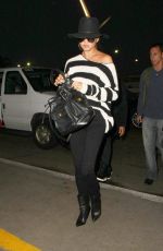 CHRISSY TEIGEN and John Legend at LAX Airport in Los Angeles 01/06/2017