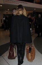 CONNIE NIELSEN at LAX Airport in Los Angeles 01/12/2017