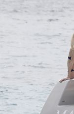 DEVON WINDSOR in Bikini at a Boat in St. Barth 01/30/2017
