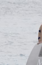 DEVON WINDSOR in Bikini at a Boat in St. Barth 01/30/2017
