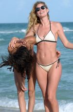DOUTZEN KROES and JOAN SMALLS in Bikini on the Beach in Miami 01/01/2016