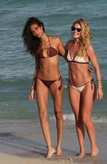 DOUTZEN KROES and JOAN SMALLS in Bikini on the Beach in Miami 01/01/2016