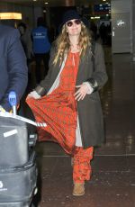 DREW BARRYMORE at CDG Airport in Paris 01/18/2017