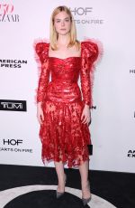 ELLE FANNING at Harper