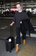 ELLE FANNING at Los Angeles International Airport 01/26/2017