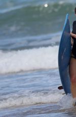 HILARY DUFF in Bikini on the Beach in Hawaii 12/31/2016