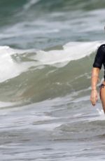 HILARY DUFF in Bikini on the Beach in Hawaii 12/31/2016