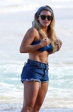 HILARY DUFF in Daisy Dukes and Bikini Top on the Beach in Hawaii 01/02/2017