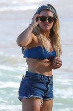 HILARY DUFF in Daisy Dukes and Bikini Top on the Beach in Hawaii 01/02/2017