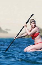 IGGY AZALEA in Bikini at a Yacht in Cabo San Lucas 01/22/2017