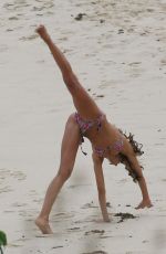 IZABEL GOULARD in Bikini Doing Gymnastic on the Beach in St. Barts 12/31/2016