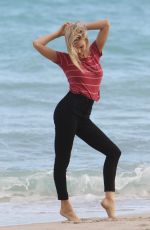 JOY CORRIGAN on the Set of a Photoshot on the Beach in Miami 01/15/2017
