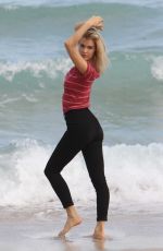 JOY CORRIGAN on the Set of a Photoshot on the Beach in Miami 01/15/2017