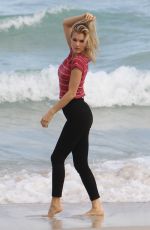 JOY CORRIGAN on the Set of a Photoshot on the Beach in Miami 01/15/2017