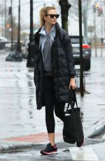 KARLIE KLOSS on a Rainy Day Out in New York 01/03/2017