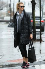 KARLIE KLOSS on a Rainy Day Out in New York 01/03/2017
